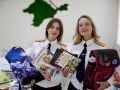 В канун Дня знаний офицеры СК России передали в многодетные крымские семьи портфели со школьными принадлежностями