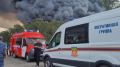 К тушению пожара на складском комплексе в Краснодаре привлекут вертолет — оперштаб Кубани